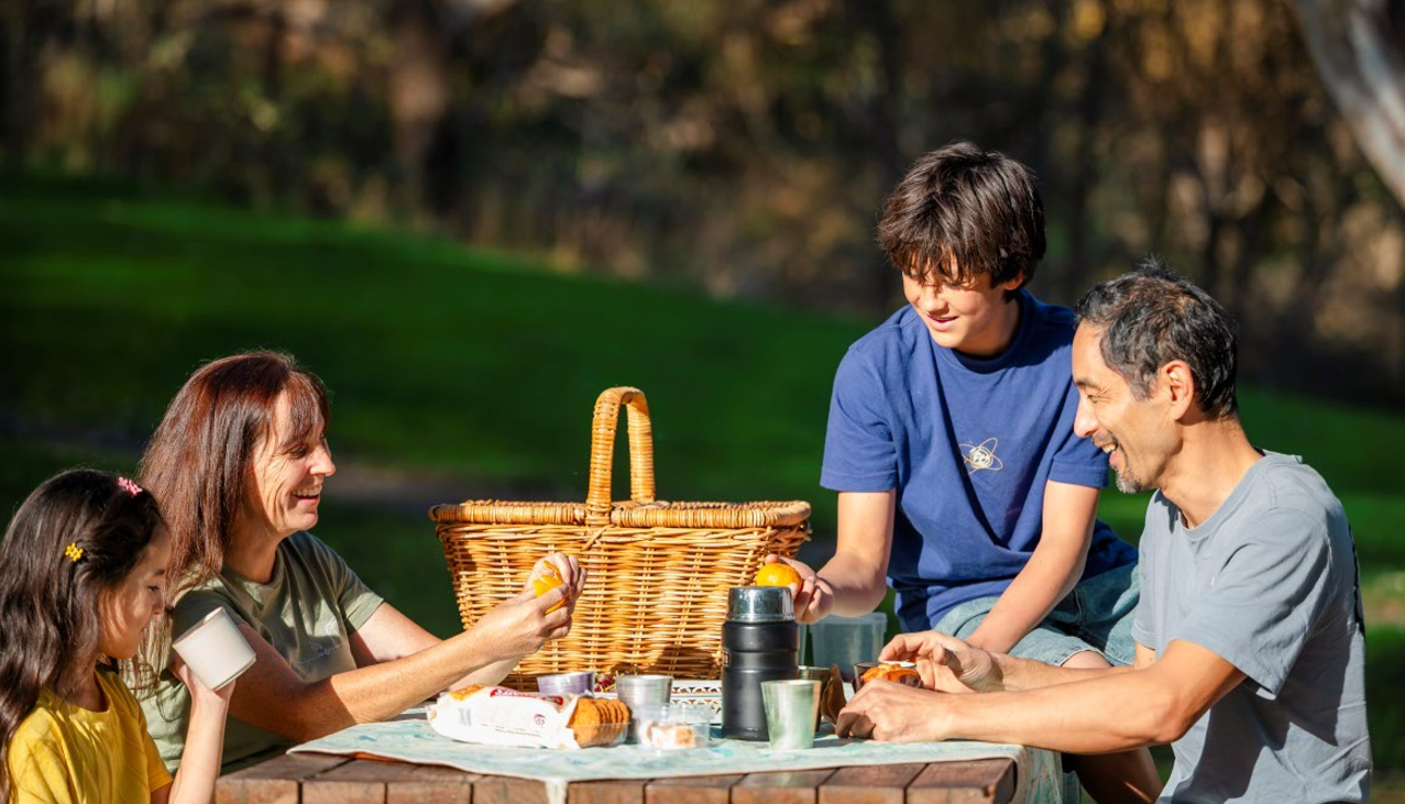 Free picnic tables located around the Adventure Playground