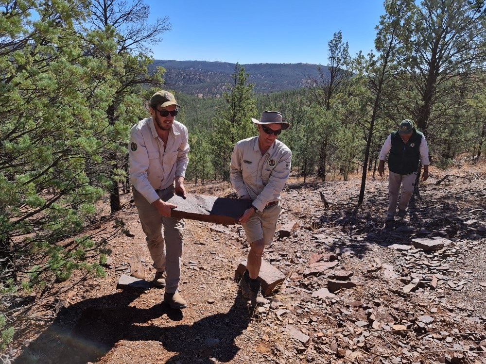 Campground host David (right) helping out rangers in Ikara-Flinders Ranges National Park.