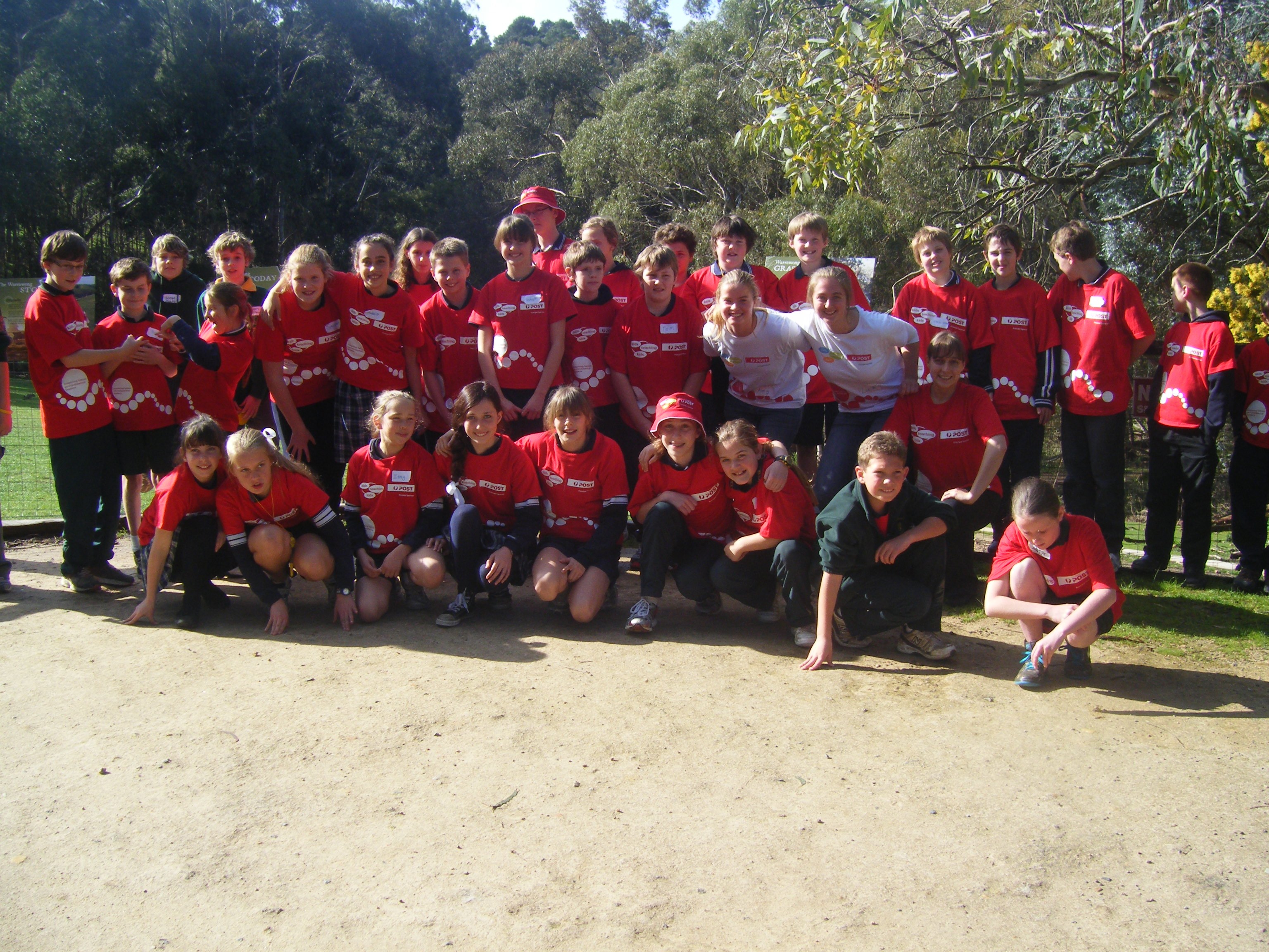 Amy with a group of students at a Kids Teaching Kids conference she hosted.