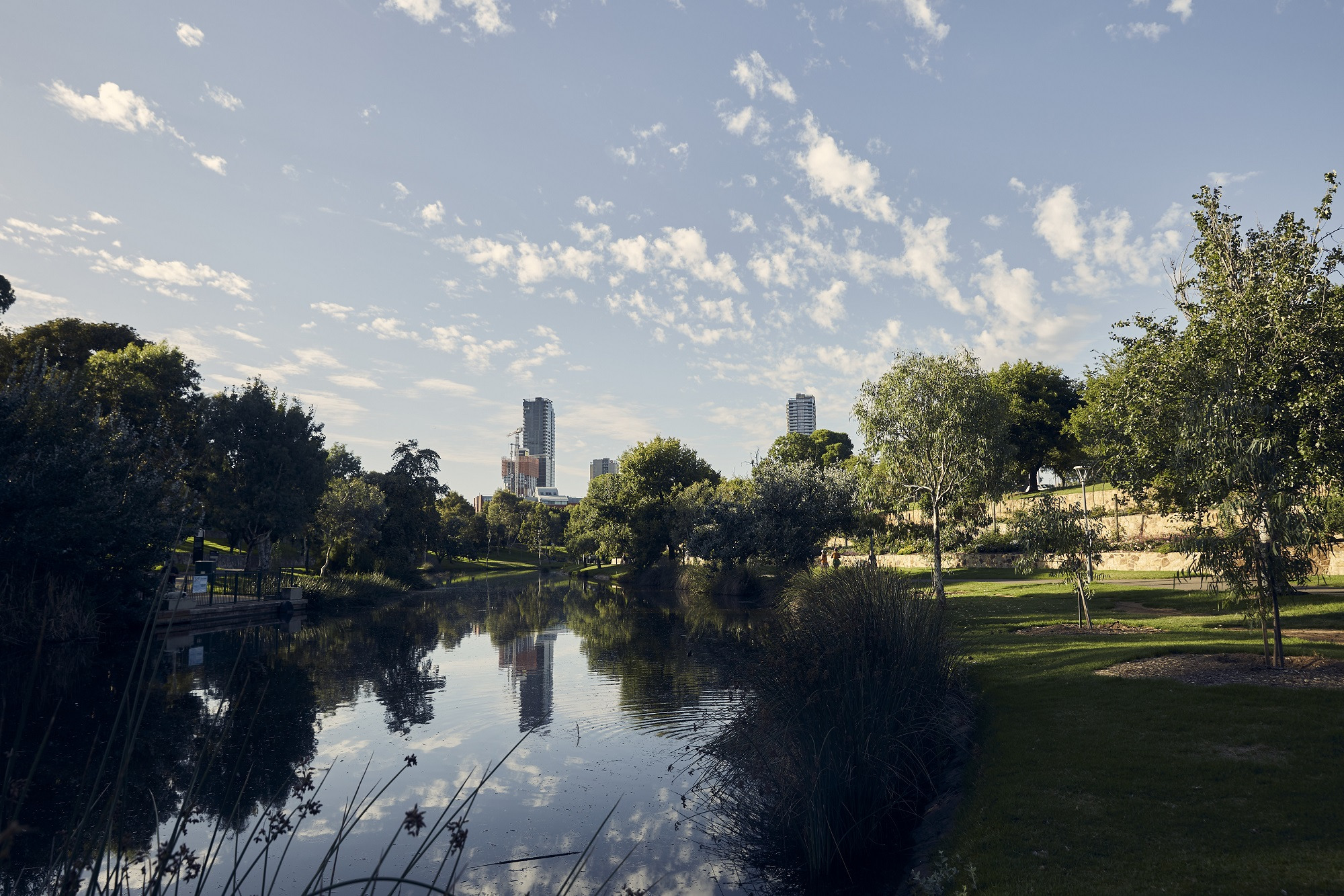 Clouds and building reflected off the River Torrens / Karawirra Pari in the heart of the Adelaide CBD.