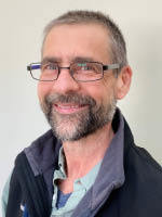 Portrait of board member Jason Size